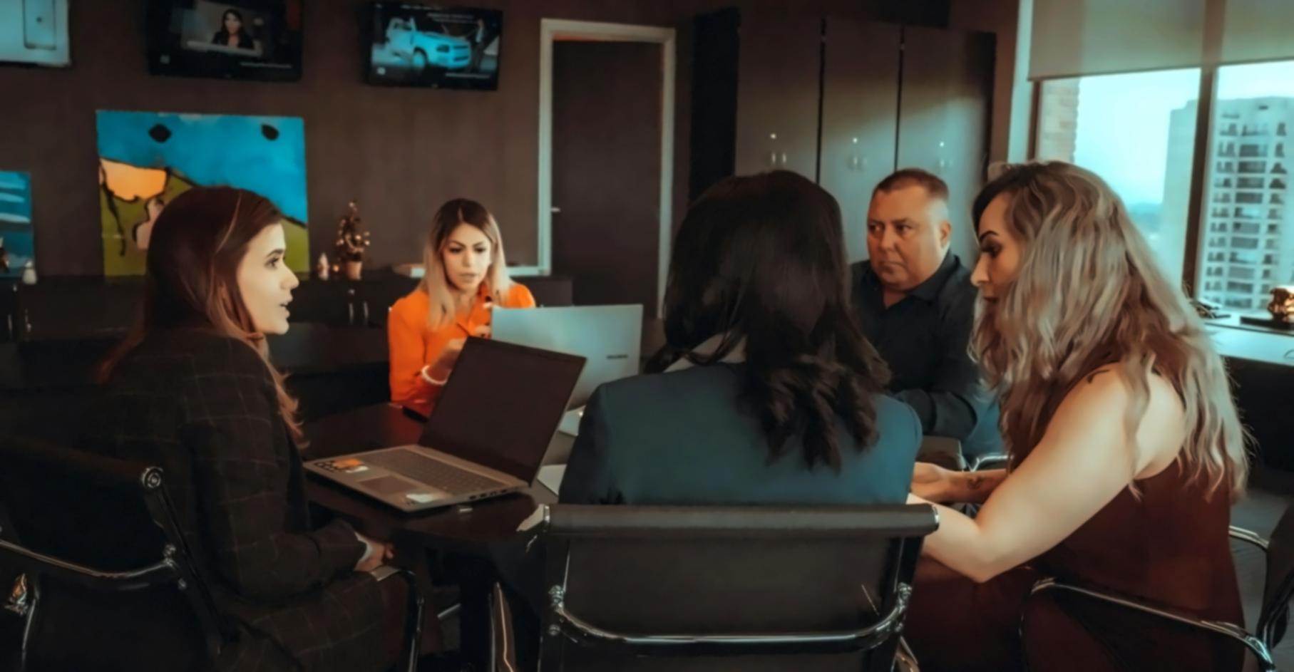 Professional team analyzing financial competitive data and market trends